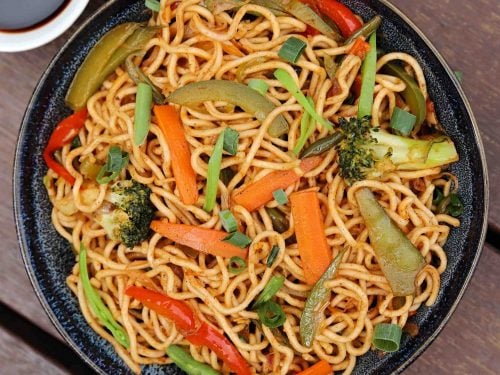 https://hebbarskitchen.com/wp-content/uploads/2019/09/veg-noodles-recipe-vegetable-noodles-how-to-make-noodles-recipe-1-500x375.jpeg